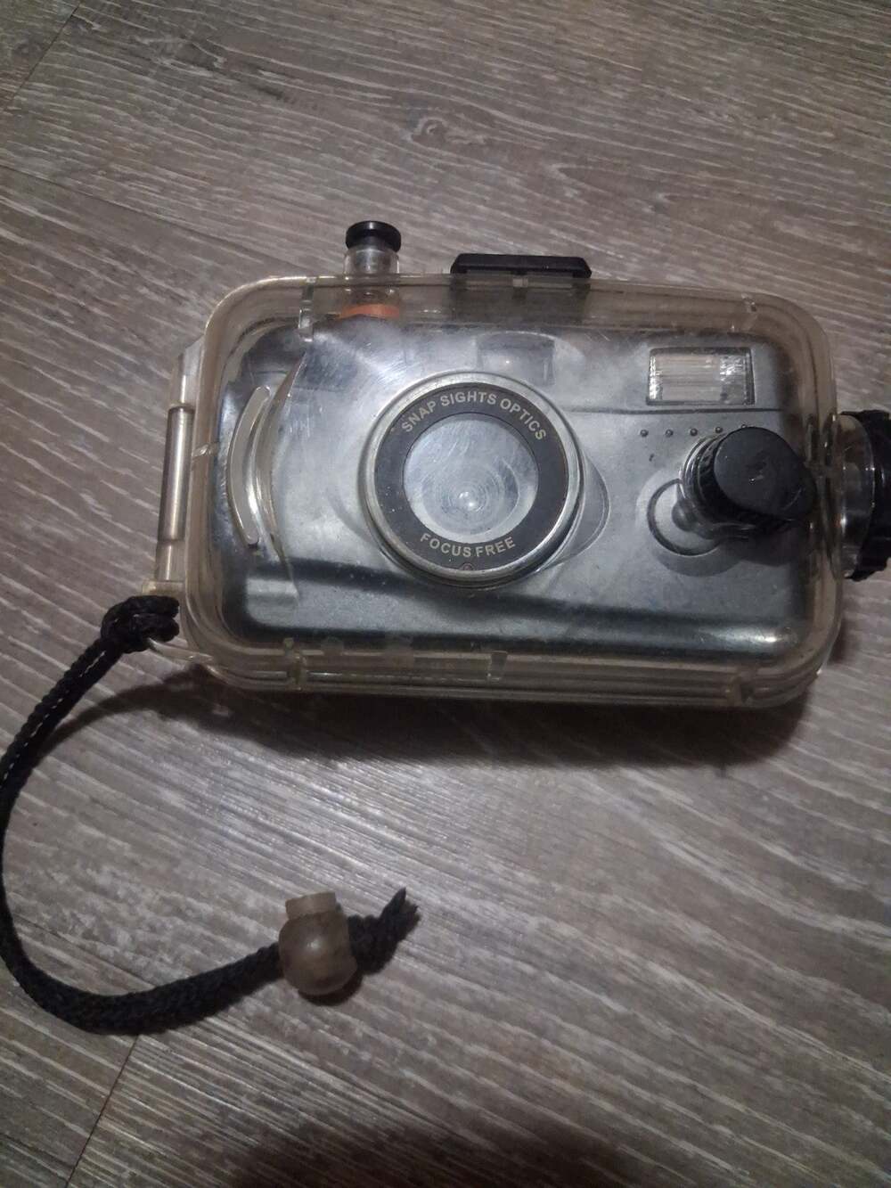 Vintage Snap Sights 35mm underwater film camera with waterproof case.